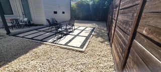 Decorative gravel and paver walkway installation in Central Texas